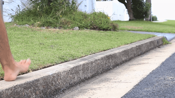 Walking barefoot along a road