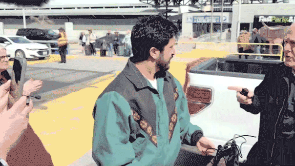 GIF of Senator Cornyn and Congressman Casar arguing at Austin airport