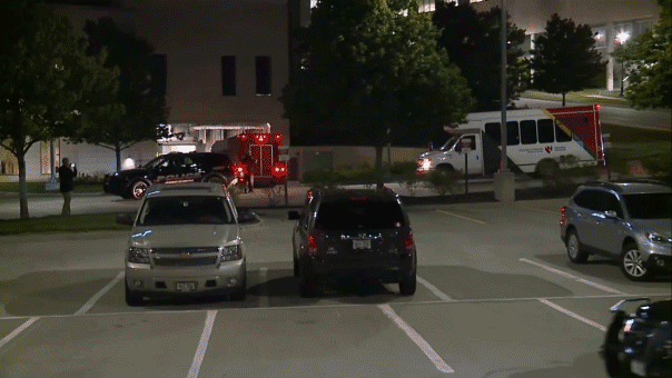 GIF shows hantavirus cruise ship passengers arriving at Nebraska hospital