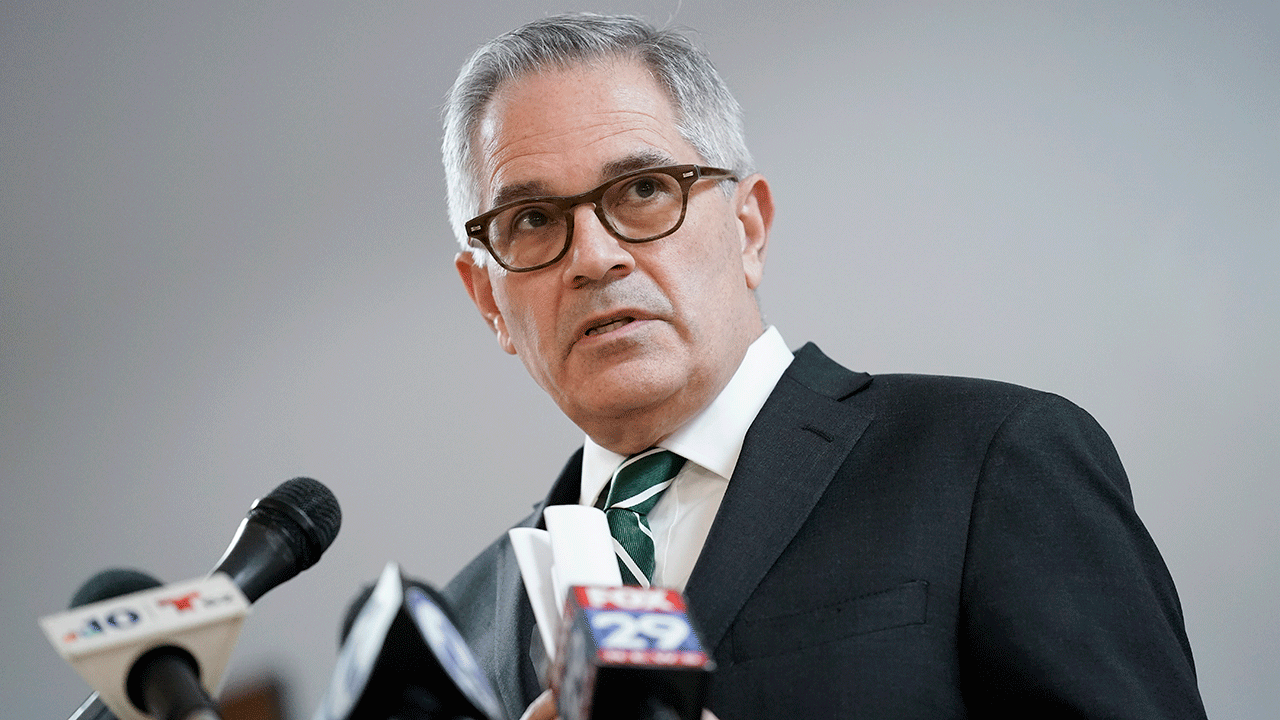 Larry Krasner speaks at a press conference