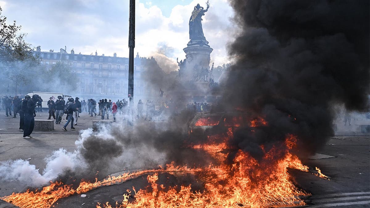 France on edge with 70,000 police deployed for unrest as authorities probe suspected terror attack near Paris